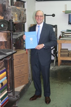 Loyd Grossman OBE collecting his Cambridge Ph.D. thesis from our workshop.